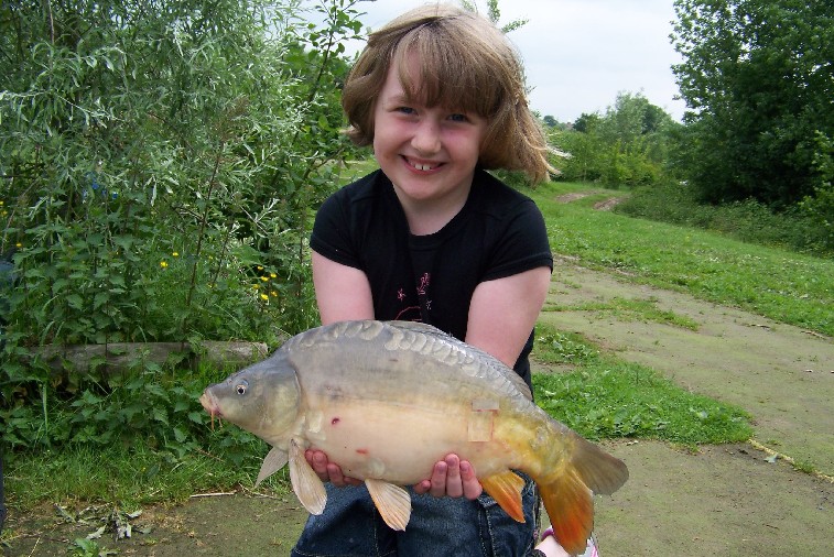 Charley with a nice Pastie (Mirror Carp).